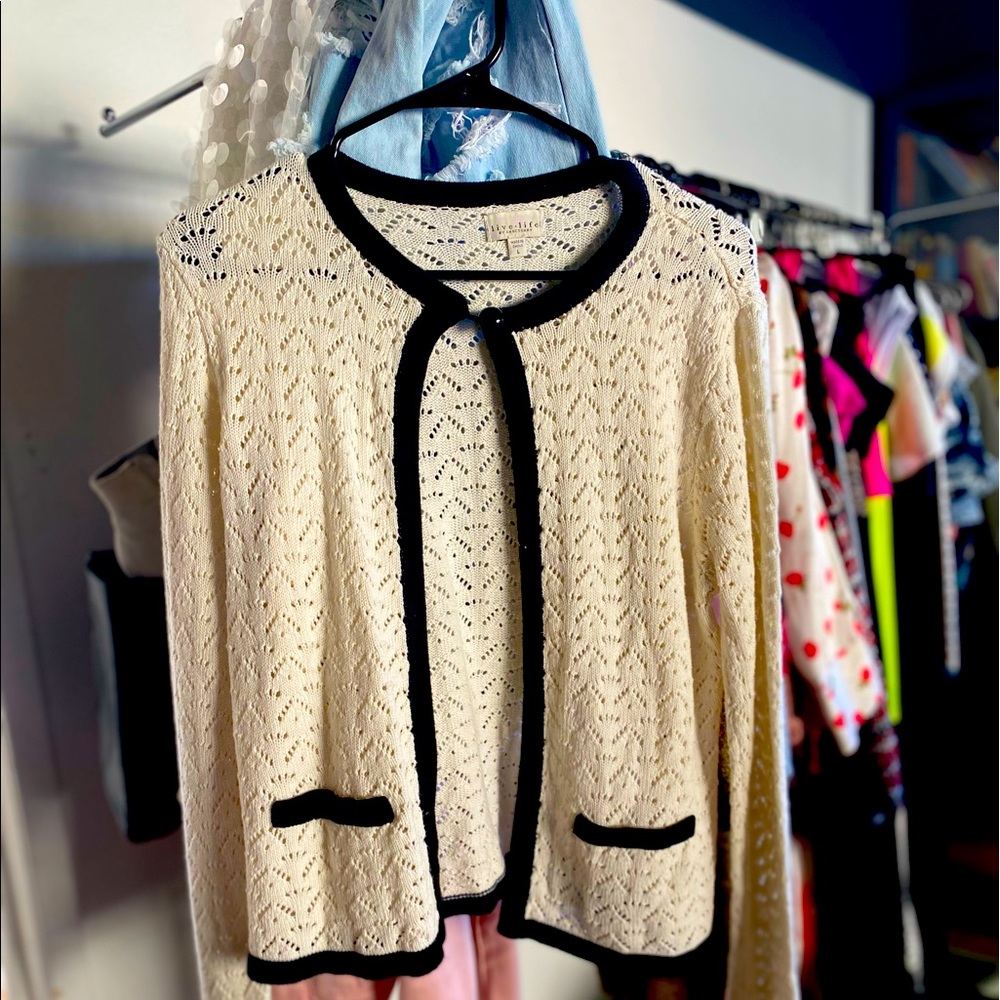 White knit/crochet cardigan.
